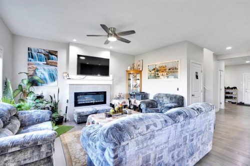 99 Savanna Way Ne, Calgary, AB - Indoor Photo Showing Living Room With Fireplace