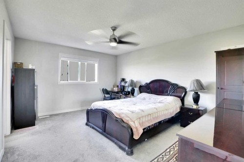 99 Savanna Way Ne, Calgary, AB - Indoor Photo Showing Bedroom
