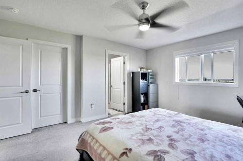 99 Savanna Way Ne, Calgary, AB - Indoor Photo Showing Bedroom