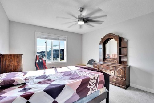 99 Savanna Way Ne, Calgary, AB - Indoor Photo Showing Bedroom