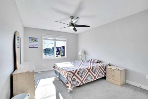 99 Savanna Way Ne, Calgary, AB - Indoor Photo Showing Bedroom