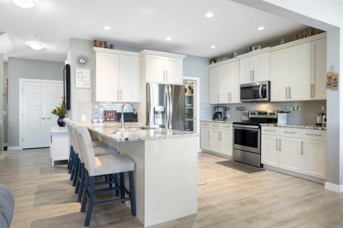 218 Willow Place, Cochrane, AB - Indoor Photo Showing Kitchen With Stainless Steel Kitchen With Upgraded Kitchen