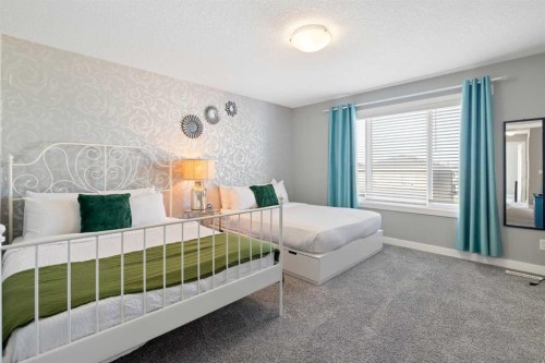 218 Willow Place, Cochrane, AB - Indoor Photo Showing Bedroom