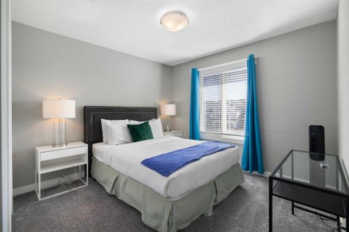 218 Willow Place, Cochrane, AB - Indoor Photo Showing Bedroom