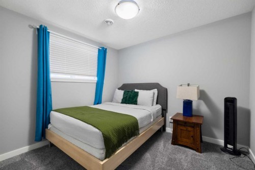 218 Willow Place, Cochrane, AB - Indoor Photo Showing Bedroom
