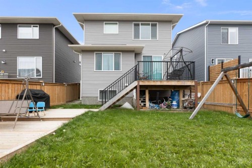 218 Willow Place, Cochrane, AB - Outdoor With Deck Patio Veranda With Exterior