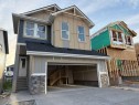 111 Sundown Crescent, Cochrane, AB  - Outdoor With Facade 