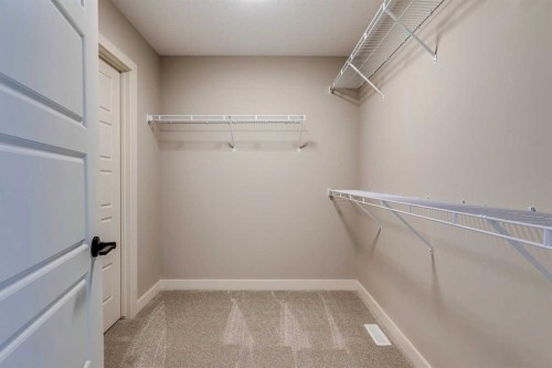 111 Sundown Crescent, Cochrane, AB - Indoor With Storage