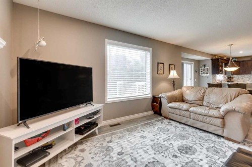 274 Mt Assiniboine Place Se, Calgary, AB - Indoor Photo Showing Living Room