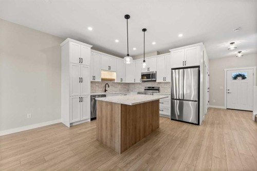 1326 23 Street, Didsbury, AB - Indoor Photo Showing Kitchen With Upgraded Kitchen