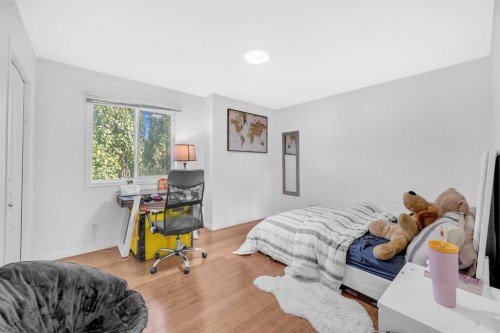 101 Springmere Road, Chestermere, AB - Indoor Photo Showing Bedroom