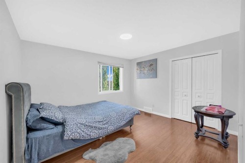 101 Springmere Road, Chestermere, AB - Indoor Photo Showing Bedroom