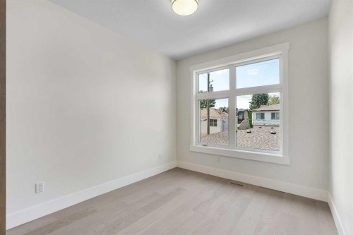 1130A Regent Crescent Ne, Calgary, AB - Indoor Photo Showing Other Room