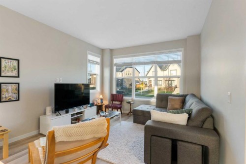249 Masters Avenue Se, Calgary, AB - Indoor Photo Showing Living Room