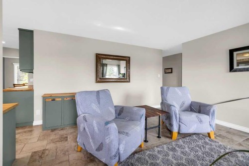 1215 Mapleglade Place Se, Calgary, AB - Indoor Photo Showing Living Room