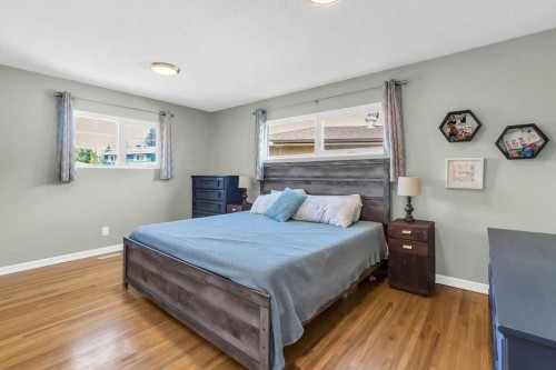1215 Mapleglade Place Se, Calgary, AB - Indoor Photo Showing Bedroom