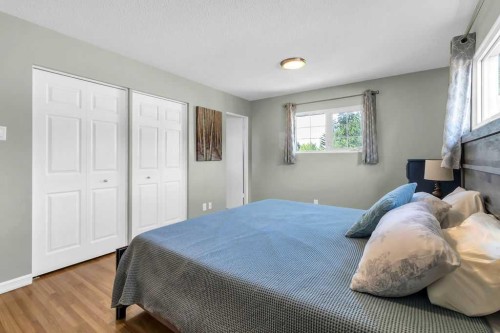 1215 Mapleglade Place Se, Calgary, AB - Indoor Photo Showing Bedroom