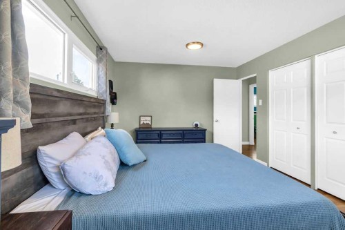 1215 Mapleglade Place Se, Calgary, AB - Indoor Photo Showing Bedroom