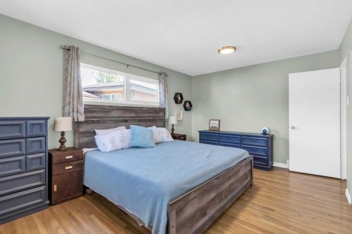 1215 Mapleglade Place Se, Calgary, AB - Indoor Photo Showing Bedroom