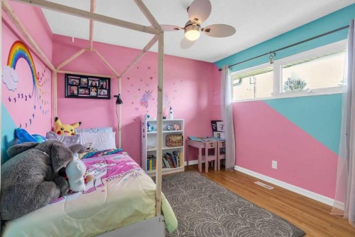 1215 Mapleglade Place Se, Calgary, AB - Indoor Photo Showing Bedroom