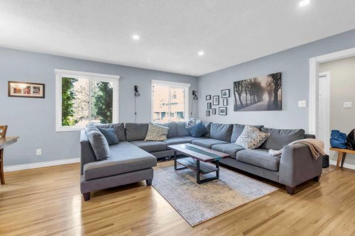 1215 Mapleglade Place Se, Calgary, AB - Indoor Photo Showing Living Room