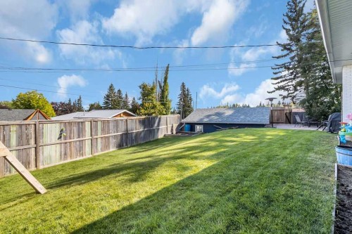 1215 Mapleglade Place Se, Calgary, AB - Outdoor With Backyard