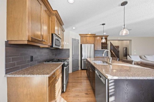80 Tuscany Summit Terrace Nw, Calgary, AB - Indoor Photo Showing Kitchen With Upgraded Kitchen