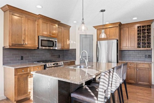 80 Tuscany Summit Terrace Nw, Calgary, AB - Indoor Photo Showing Kitchen With Upgraded Kitchen