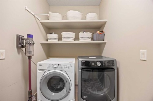 80 Tuscany Summit Terrace Nw, Calgary, AB - Indoor Photo Showing Laundry Room
