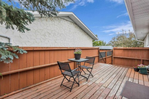 403 Queen Alexandra Way Se, Calgary, AB - Outdoor With Deck Patio Veranda With Exterior
