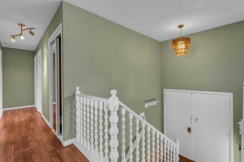 403 Queen Alexandra Way Se, Calgary, AB - Indoor Photo Showing Other Room