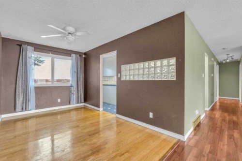 403 Queen Alexandra Way Se, Calgary, AB - Indoor Photo Showing Other Room