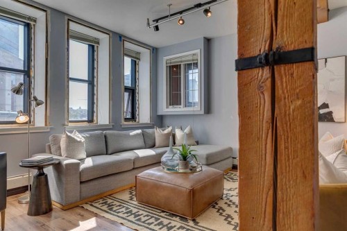 221-220 11 Avenue Se, Calgary, AB - Indoor Photo Showing Living Room