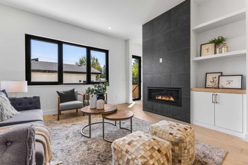 3716 44 Street Sw, Calgary, AB - Indoor Photo Showing Living Room With Fireplace