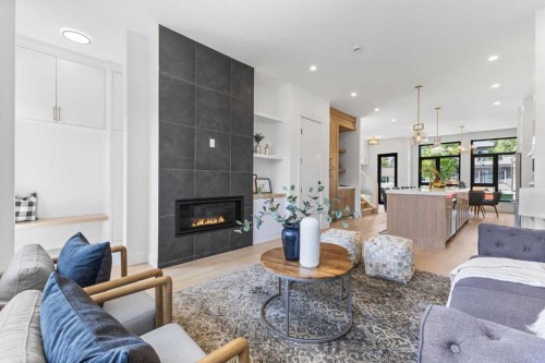 3716 44 Street Sw, Calgary, AB - Indoor Photo Showing Living Room With Fireplace