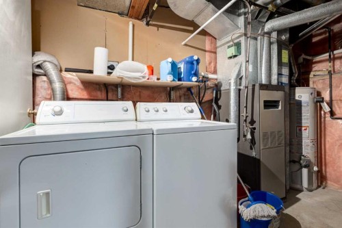 27 Bedfield Close Ne, Calgary, AB - Indoor Photo Showing Laundry Room