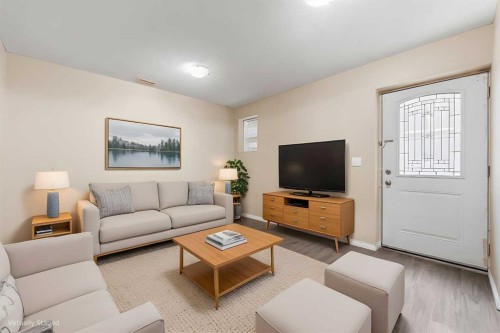 234 Tarawood Place Ne, Calgary, AB - Indoor Photo Showing Living Room