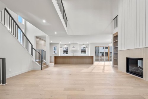 30 Greenwich Row Nw, Calgary, AB - Indoor With Fireplace