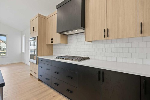 116 Mitchell Walk Nw, Calgary, AB - Indoor Photo Showing Kitchen With Upgraded Kitchen