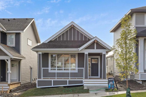 116 Mitchell Walk Nw, Calgary, AB - Outdoor With Deck Patio Veranda With Facade