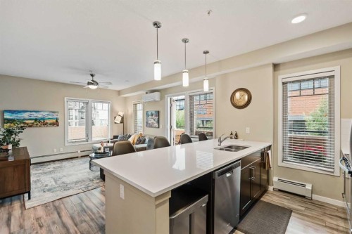 204-10 Mahogany Mews Se, Calgary, AB - Indoor Photo Showing Kitchen With Double Sink