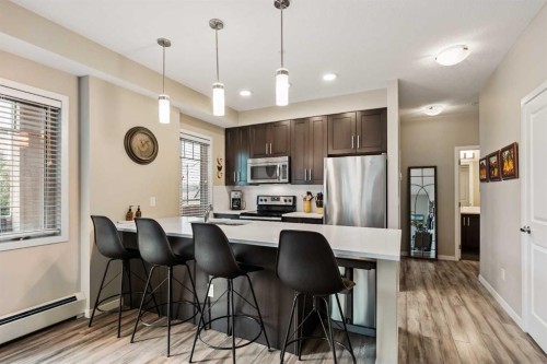 204-10 Mahogany Mews Se, Calgary, AB - Indoor Photo Showing Kitchen With Stainless Steel Kitchen With Upgraded Kitchen