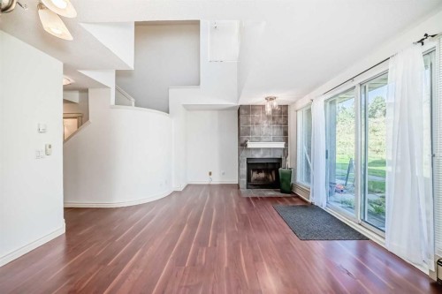10-305 Village Mews Sw, Calgary, AB - Indoor With Fireplace