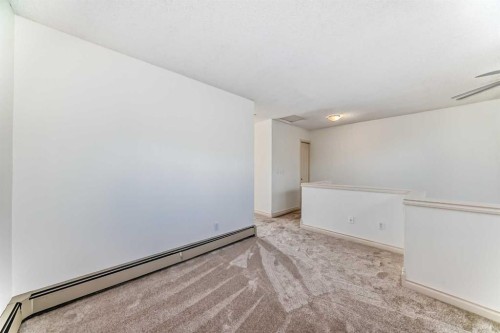 10-305 Village Mews Sw, Calgary, AB - Indoor Photo Showing Other Room