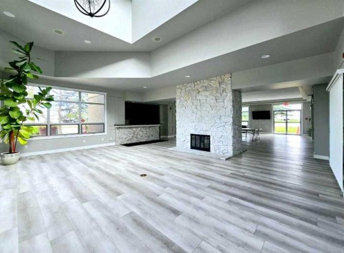 10-305 Village Mews Sw, Calgary, AB - Indoor With Fireplace