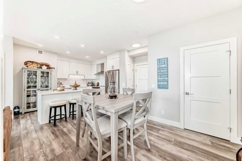 210-8355 19 Avenue Sw, Calgary, AB - Indoor Photo Showing Dining Room