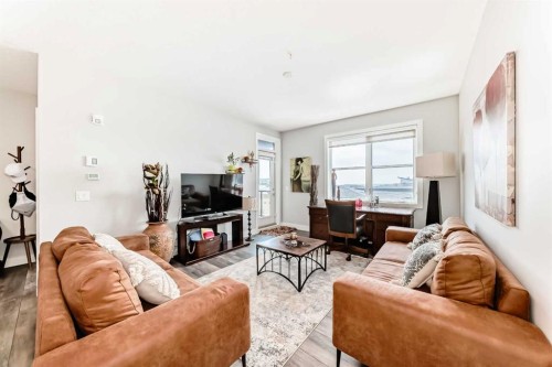 210-8355 19 Avenue Sw, Calgary, AB - Indoor Photo Showing Living Room