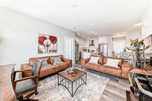 210-8355 19 Avenue Sw, Calgary, AB - Indoor Photo Showing Living Room