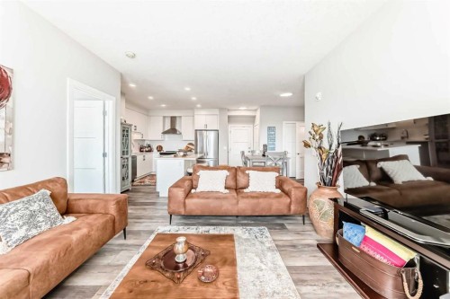 210-8355 19 Avenue Sw, Calgary, AB - Indoor Photo Showing Living Room