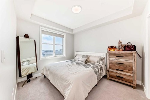 210-8355 19 Avenue Sw, Calgary, AB - Indoor Photo Showing Bedroom